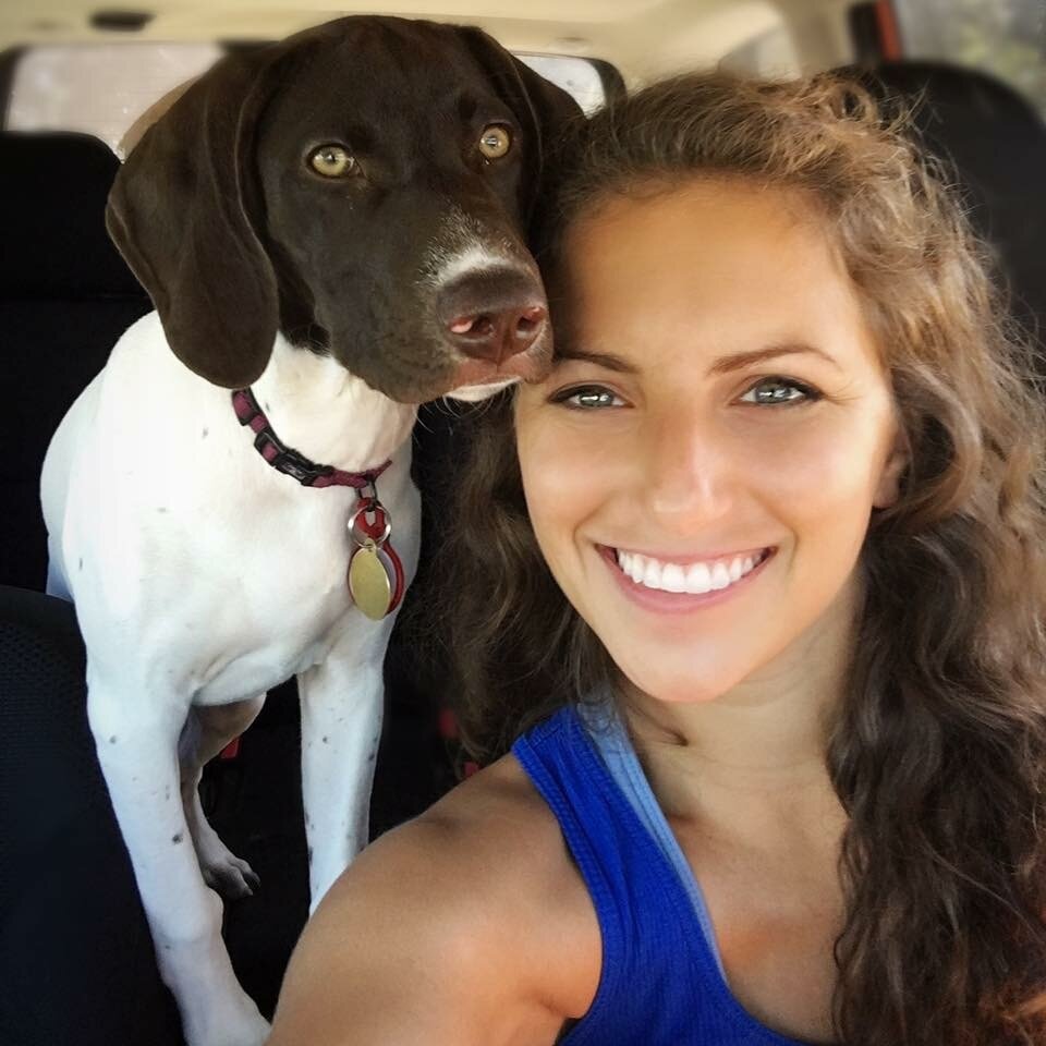 Leigh Headshot with dog Penny.JPG